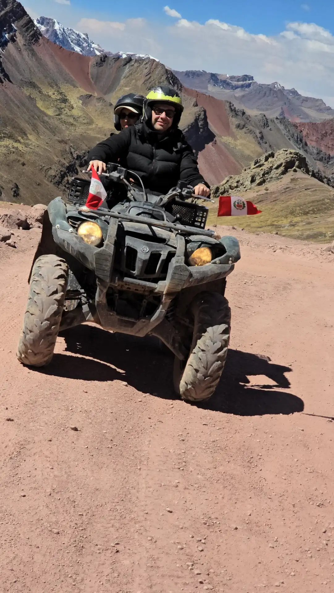 Line of quad bikes parked on a high Andean plateau on the way to Vinicunca