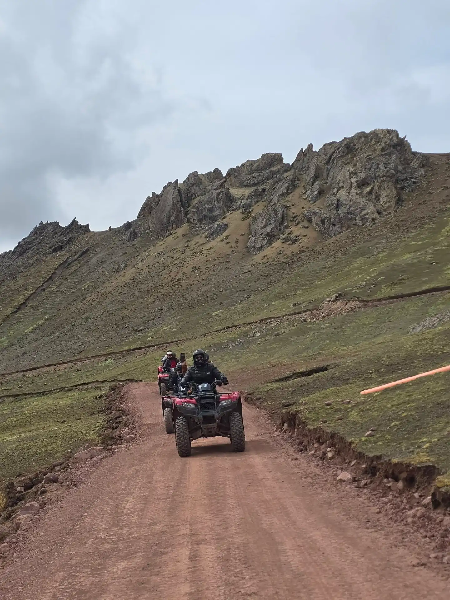 Deep red eroded ridges of the Red Valley near Rainbow Mountain, Cusco region, Peru